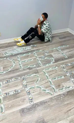 YK Osiris’ Outfit in Prada Shirt & Don't Let Mom Find Out Jeans (2022)