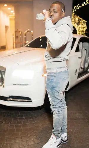 Bobby Shmurda’s Outfit in Dior Hoodie, Amiri Jeans & Jordan Sneakers (2022)