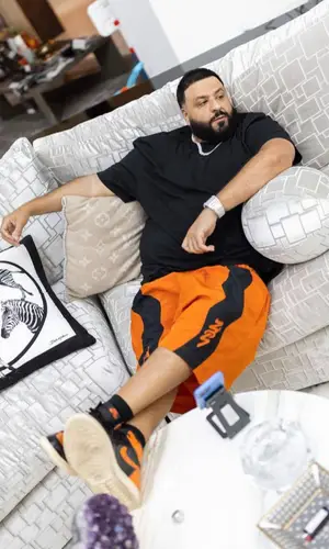 DJ Khaled wearing Polo Ralph Lauren t-shirt