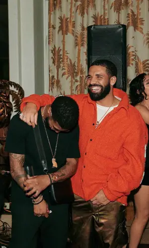 Drake wearing Feng Chen Wang pants