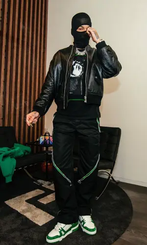Sfera Ebbasta wearing Louis Vuitton bag
