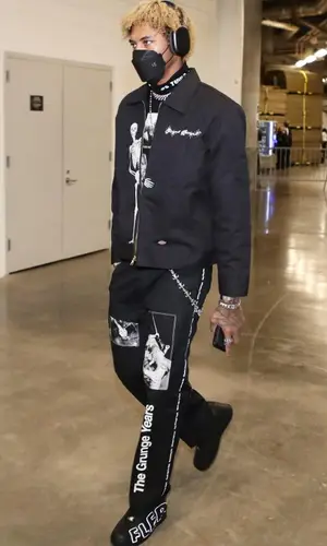 Kelly Oubre Jr wearing Nike sneakers