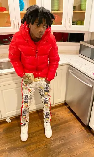 Jdot Breezy wearing Moncler jacket