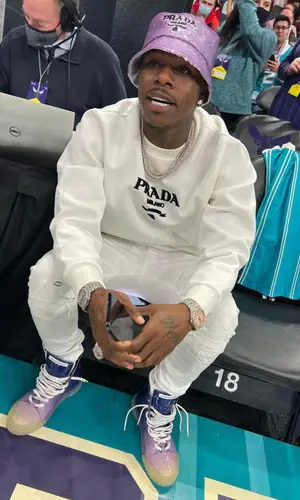 DaBaby wearing Prada sweatshirt