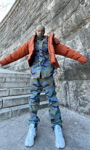 Bloody Osiris wearing Maison Margiela sneakers