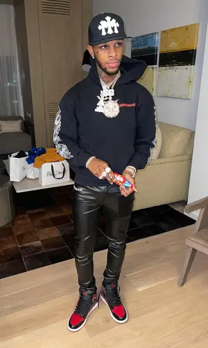 Toosii wearing Chrome Hearts hoody