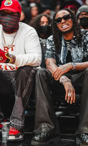 Quavo wearing Bottega Veneta boots