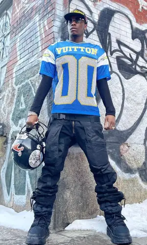 Bloody Osiris wearing Louis Vuitton boots