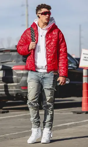 Patrick Mahomes II’s Outfit in Off-White Hoodie, Louis Vuitton Backpack & Oakley Eyewear (2022)
