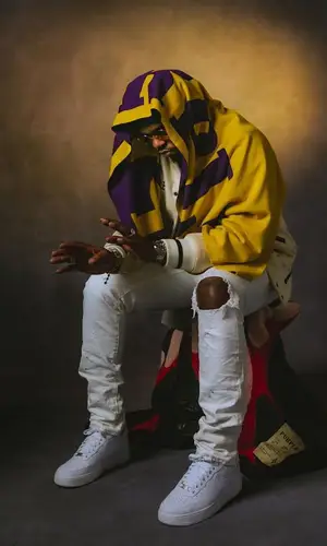 Gunna wearing Purple Brand jacket