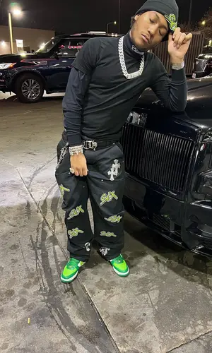Lil Meech wearing Elliot Eliantte sweatshirt