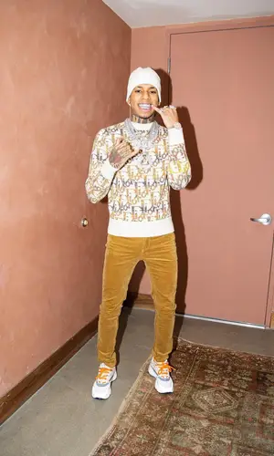 NLE Choppa wearing Moose Knuckles hat