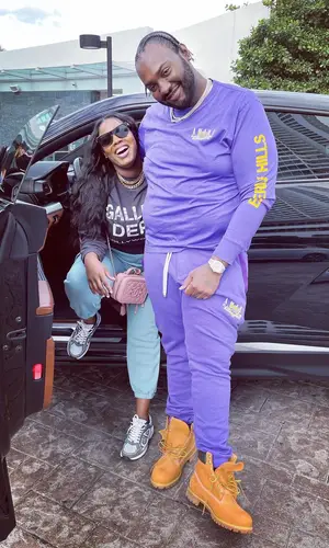 Peezy wearing Timberland boots