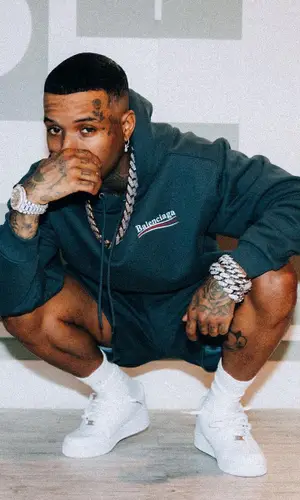 Tory Lanez’s Outfit in Balenciaga Hoodie & Nike Sneakers (2022)