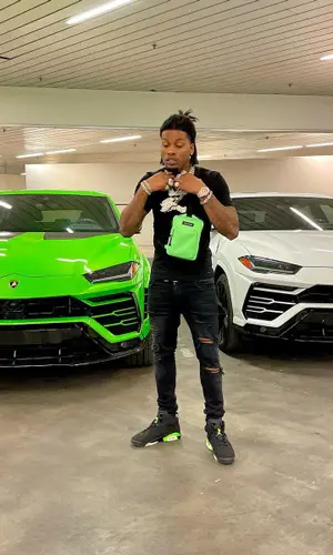 CJ So Cool wearing Balenciaga bag