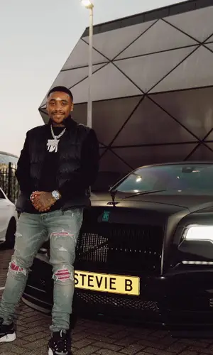 Steven Bergwijn wearing Amiri jeans