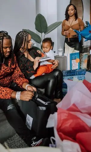 Tee Grizzley wearing Dolce & Gabbana jacket