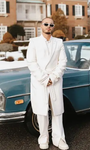 J Balvin wearing Dior boots