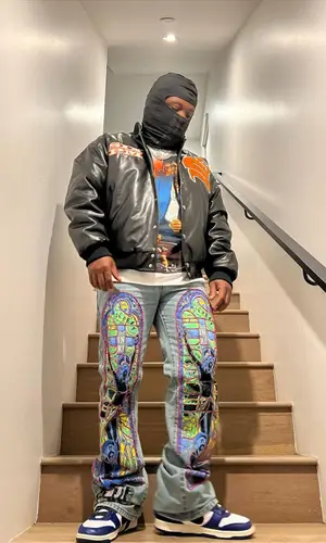 Strick wearing Nike sneakers