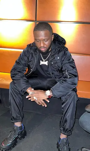Headie One wearing Prada jacket