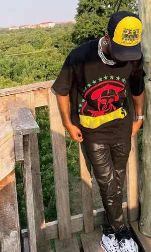 CKay wearing Puma sneakers