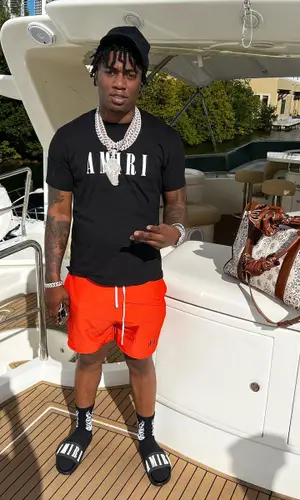 Fredo Bang wearing Amiri t-shirt