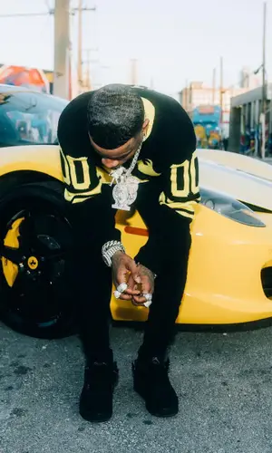 Tory Lanez wearing Amiri jeans