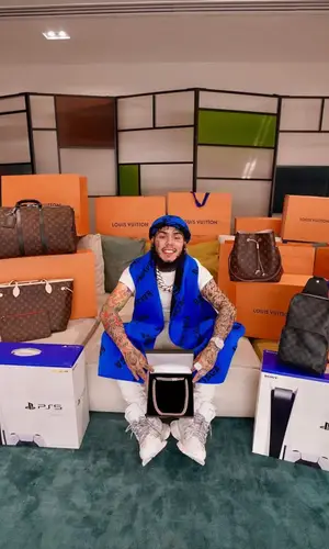6ix9ine wearing Balenciaga sneakers