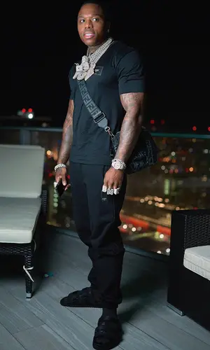 BandMan Kevo wearing Fendi pants