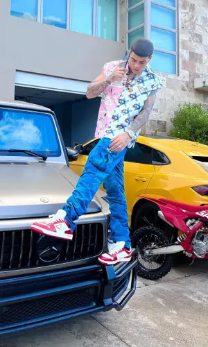 Lunay wearing Louis Vuitton pants