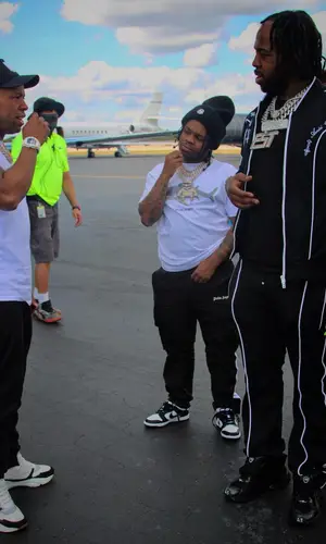 EST Gee wearing Amiri pants