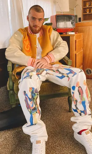 Angus Cloud wearing KidSuper jeans
