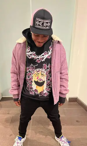 DaBaby wearing Vlone hoody