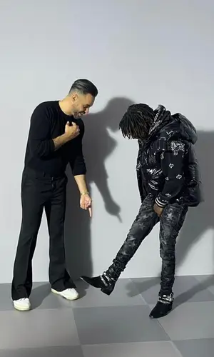 Jackboy wearing Amiri boots