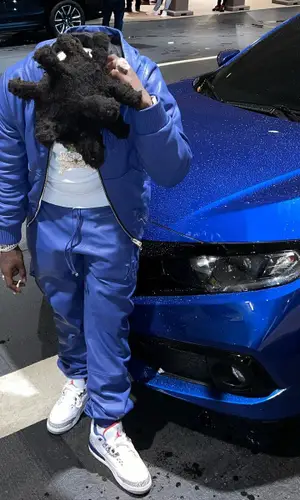 Kodak Black wearing Amiri hoody