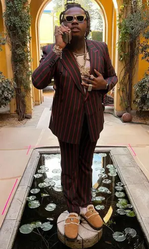 Gunna wearing Dolce & Gabbana suit