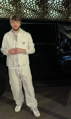 Murda Beatz wearing Dior shirt