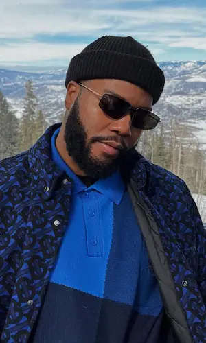 Khalid wearing Burberry jacket