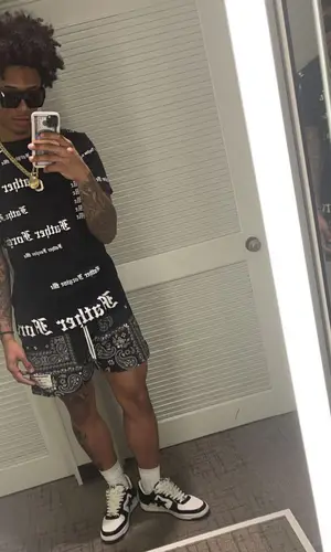 Mikey wearing Ryoko Rain shorts