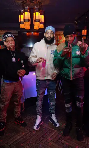 A Boogie Wit Da Hoodie wearing Timberland boots