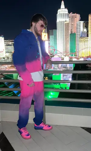 Murda Beatz wearing Louis Vuitton jeans
