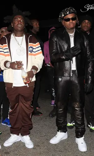 Gunna wearing Prada glov