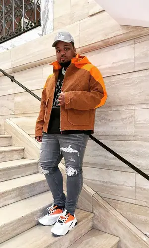 Jerry Production wearing Amiri jeans