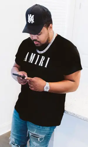 Jerry Production wearing Amiri jeans