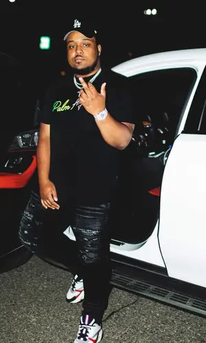 Jerry Production wearing Amiri jeans