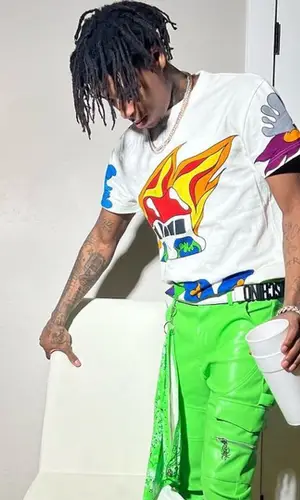 NBA YoungBoy wearing Moschino belt