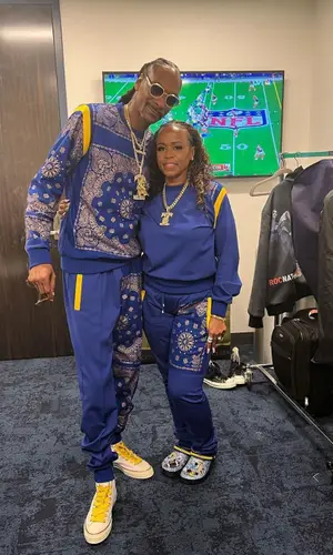 Snoop Dogg wearing Converse sneakers