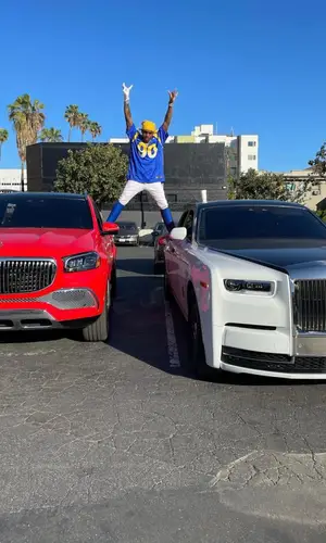 DaBaby wearing Nike jersey