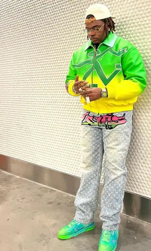 Gunna wearing Louis Vuitton jacket