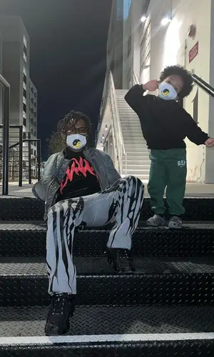 MadeinTYO wearing Nike sneakers